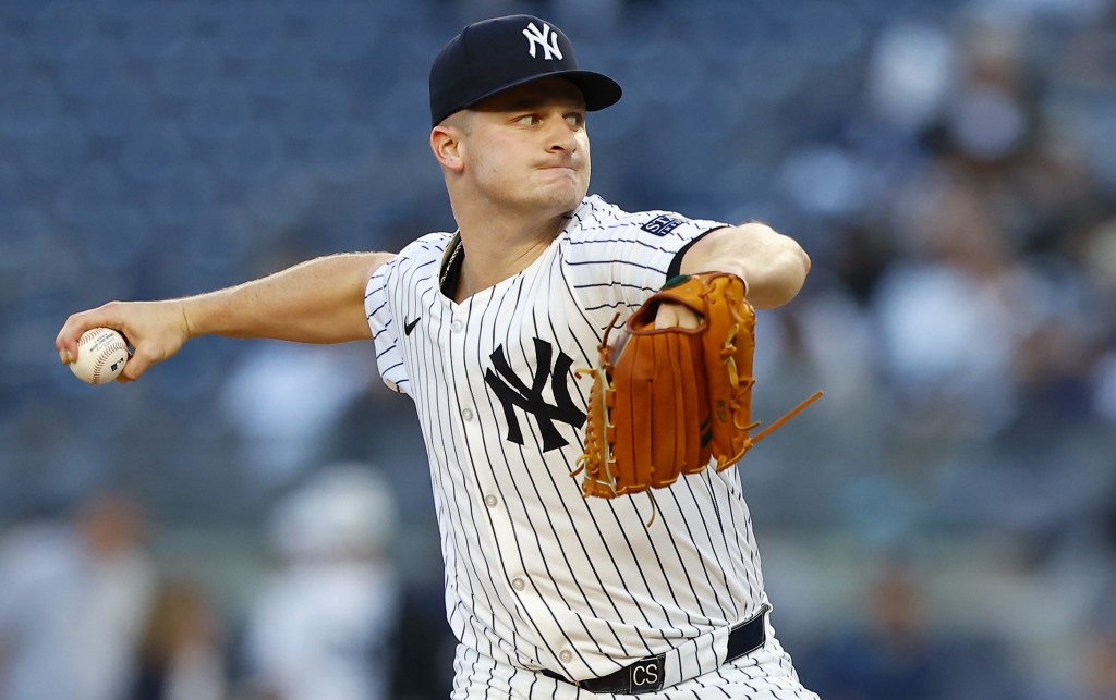 Clarke Schmidt throws a pitch during the first inning of the Yankees' victory.