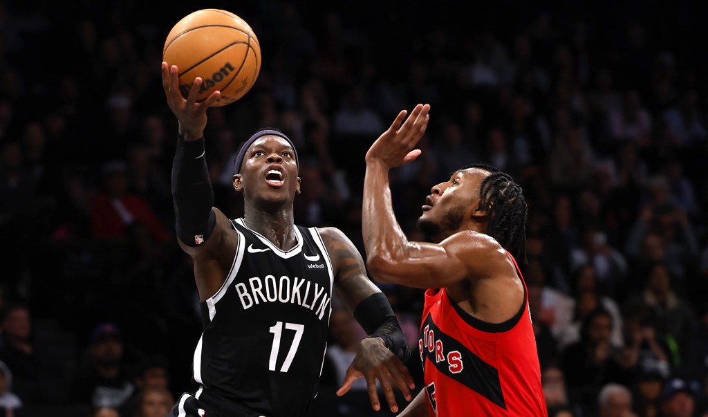 Dennis Shroder, who scored 15 of his 21 points in the fourth quarter, goes up for a layup during the Nets' 106-102 win over the Raptors.