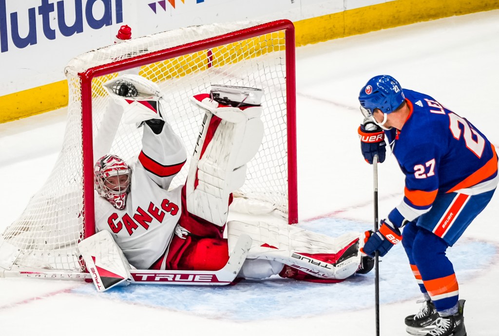 Frederik Andersen makes a sprawling glove save on Anders Lee during the Islanders' 3-2 Game 3 loss to the Hurricanes.