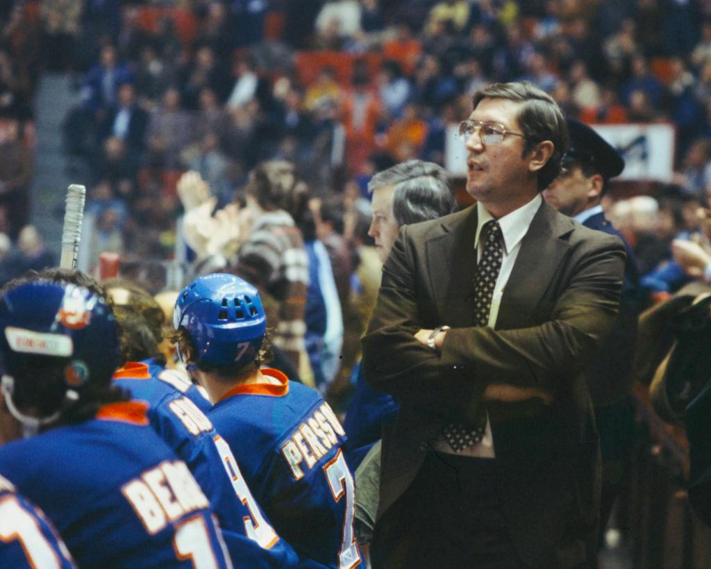 Head Coach Al Arbour of the New York Islanders follows the action from the bench Circa 1970 at the Montreal Forum in Montreal, Quebec, Canada. 
