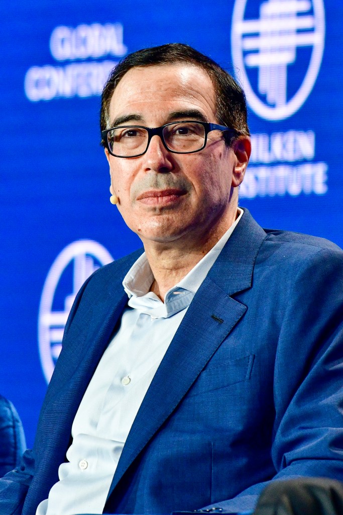 Steven Mnuchin, 77th US Secretary of Treasury, in a blue suit attending the 2023 Milken Institute Global Conference in Beverly Hills, California