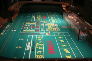 Craps is one of the most popular casino games in the world. Check out this beginner's guide for more information on how to play craps and pick up some tips to improve your play.