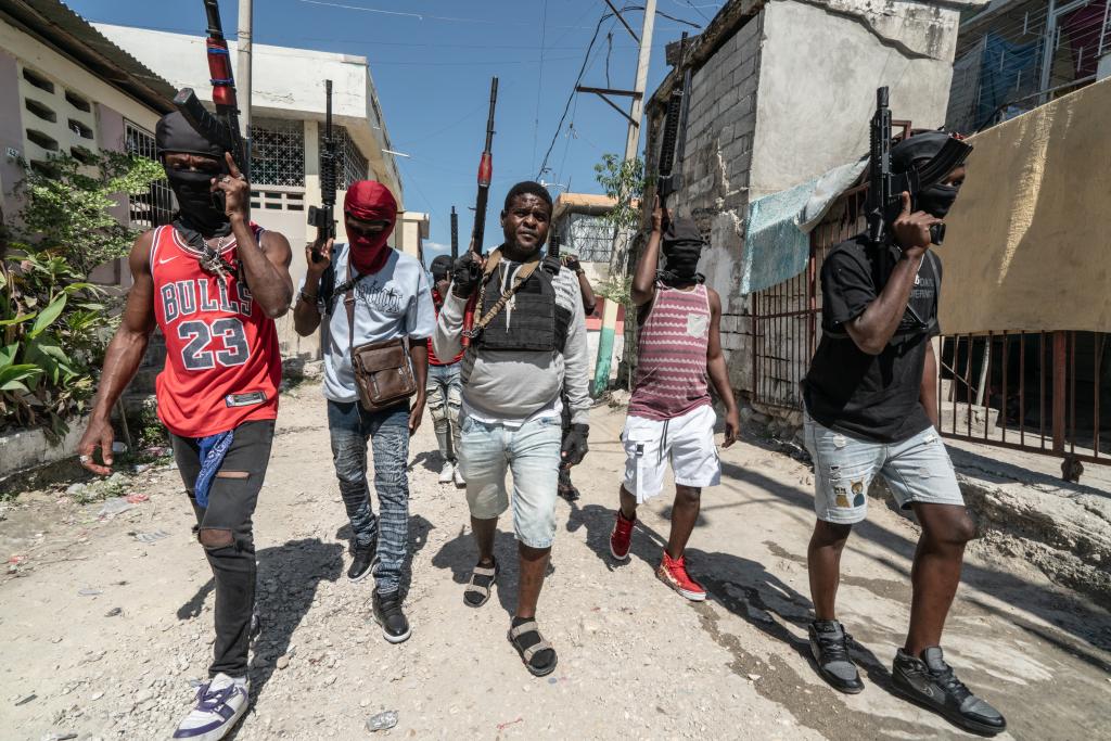 Gang Leader Jimmy 'Barbecue' Cherizier patrolling the streets with G-9 federation gang members in the Delmas 3 area on February 22, 2024, in Port-au-Prince, Haiti.