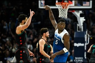 MINNEAPOLIS, MINNESOTA - APRIL 9: Anthony Edwards #5 of the Minnesota Timberwolves scores a three point shot in the fourth quarter of the game against the Washington Wizards at Target Center on April 9, 2024 in Minneapolis, Minnesota. NOTE TO USER: User expressly acknowledges and agrees that, by downloading and or using this photograph, User is consenting to the terms and conditions of the Getty Images License Agreement. (Photo by Stephen Maturen/Getty Images)