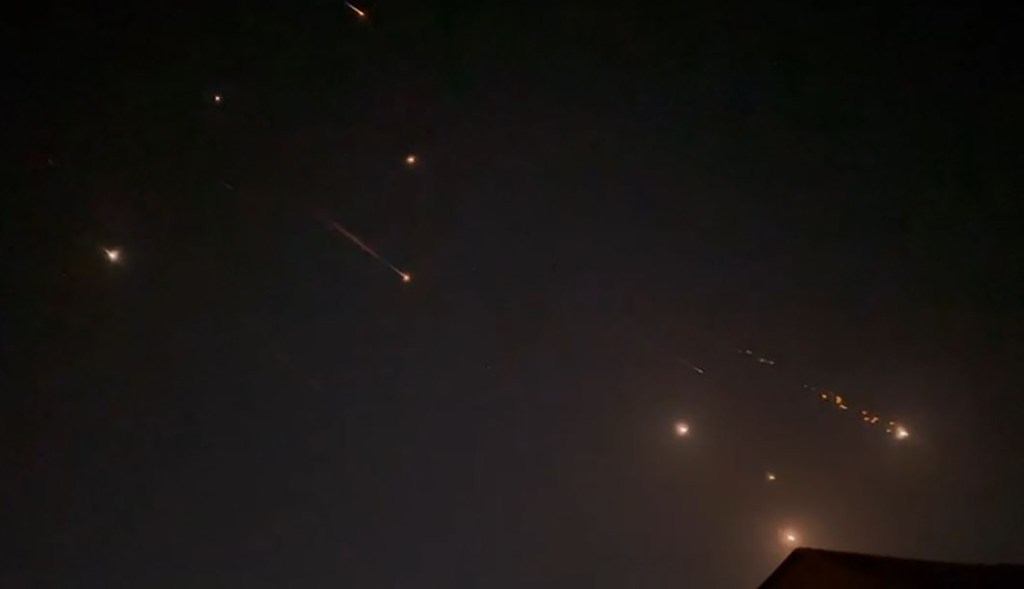 Iranian drones light up the night sky during its attack on Israel on April 14, 2024.