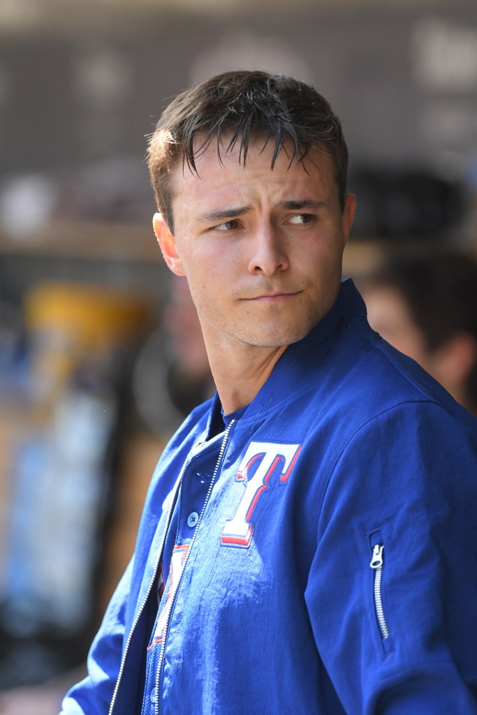 Jack Leiter looks on from the dugout in his MLB debut game against the Detroit Tigers at Comerica Park on April 18, 2024 in Detroit, Michigan. 