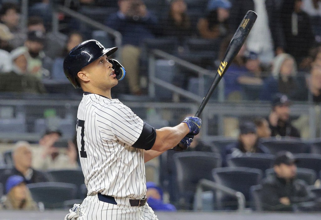 Giancarlo Stanton belts a solo homer in the sixth inning of the Yankees' 5-2 win over the Marlins.