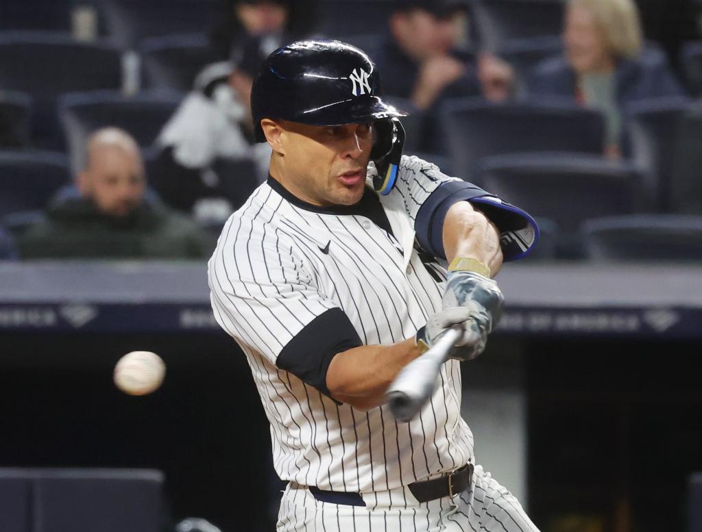 Giancarlo Stanton strikes out swinging in the seventh inning of the Yankees' loss.