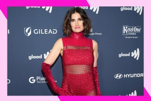 Idina Menzel poses on the red carpet.