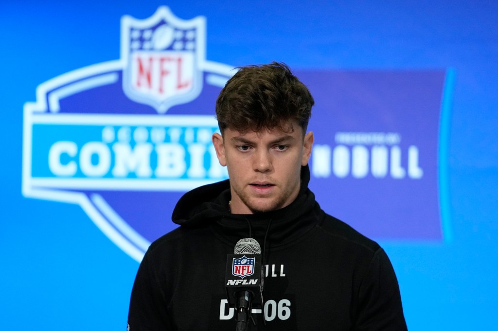 Iowa defensive back Cooper Dejean in black sweatshirt speaking with media at the NFL Scouting Combine on Feb. 29, 2024.