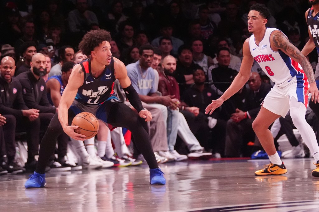 Jalen Wilson, who scored 10 points off the bench, grabs a loose ball during the Nets' win.