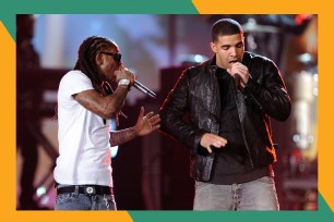 Lil Wayne (L) and Drake perform together onstage.