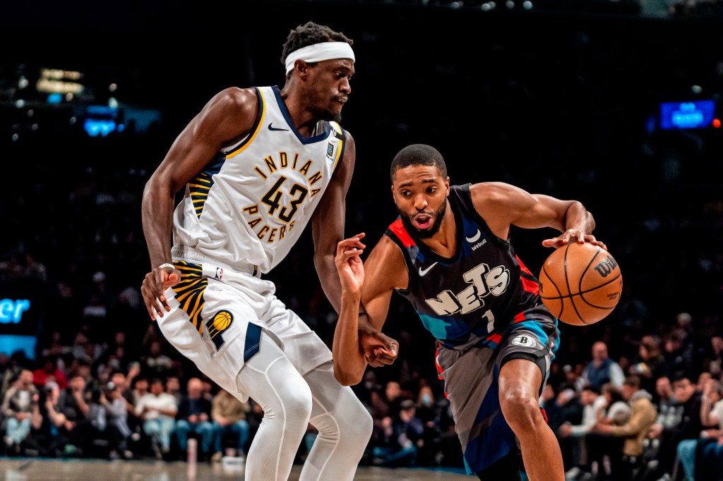 Mikal Bridges, who scored 18 points, drives on Pascal Siakam during the Nets' 115-111 win over the Pacers.