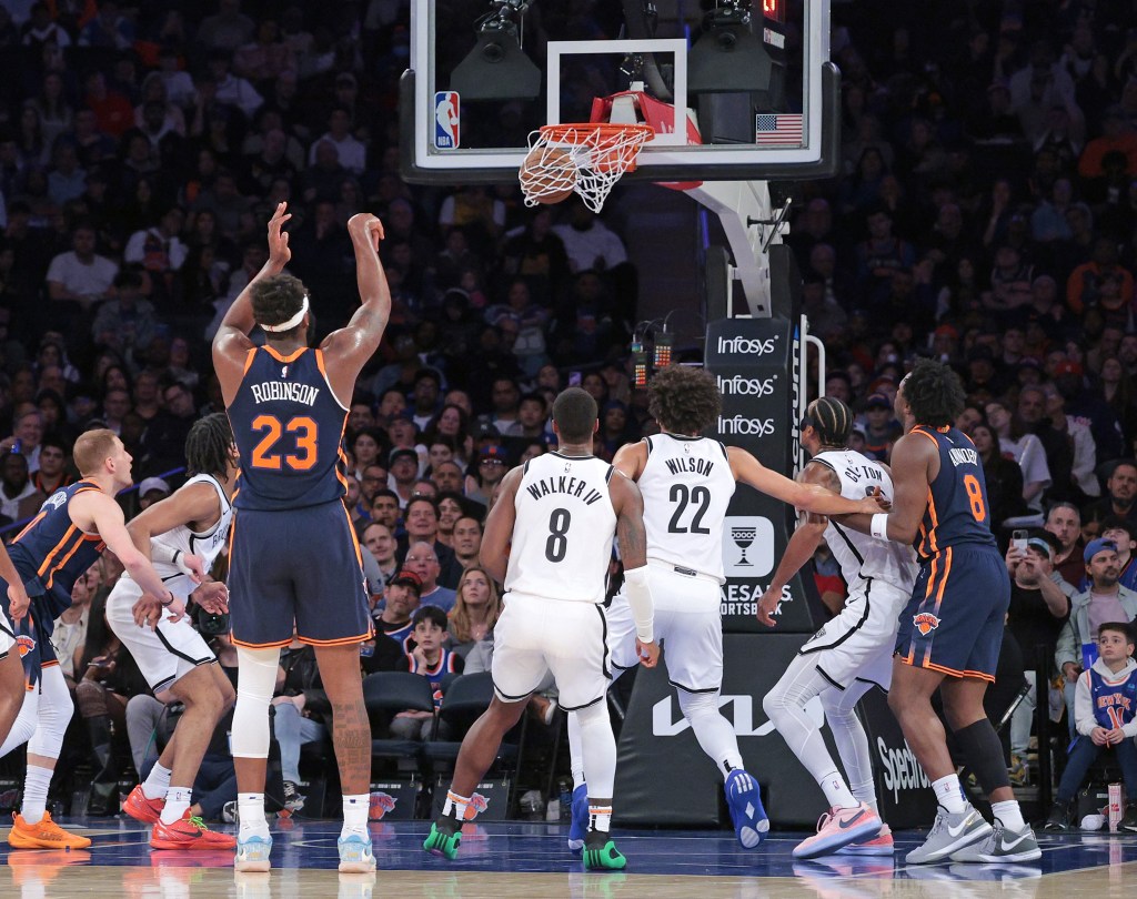 Mitchell Robinson makes a free throw during the fourth quarter of the Knicks' 111-107 win over the Nets.