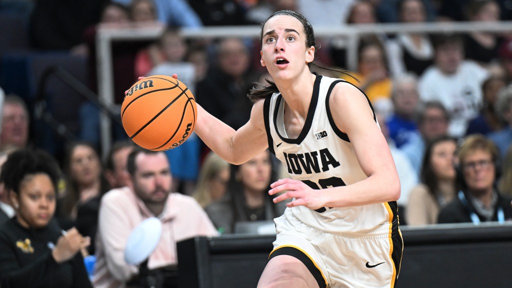 Iowa guard Caitlin Clark (22) drives to the basket against the LSU during the second half of an Elite Eight round college basketball game during the NCAA Tournament, Monday, April 1, 2024, in Albany, N.Y. 