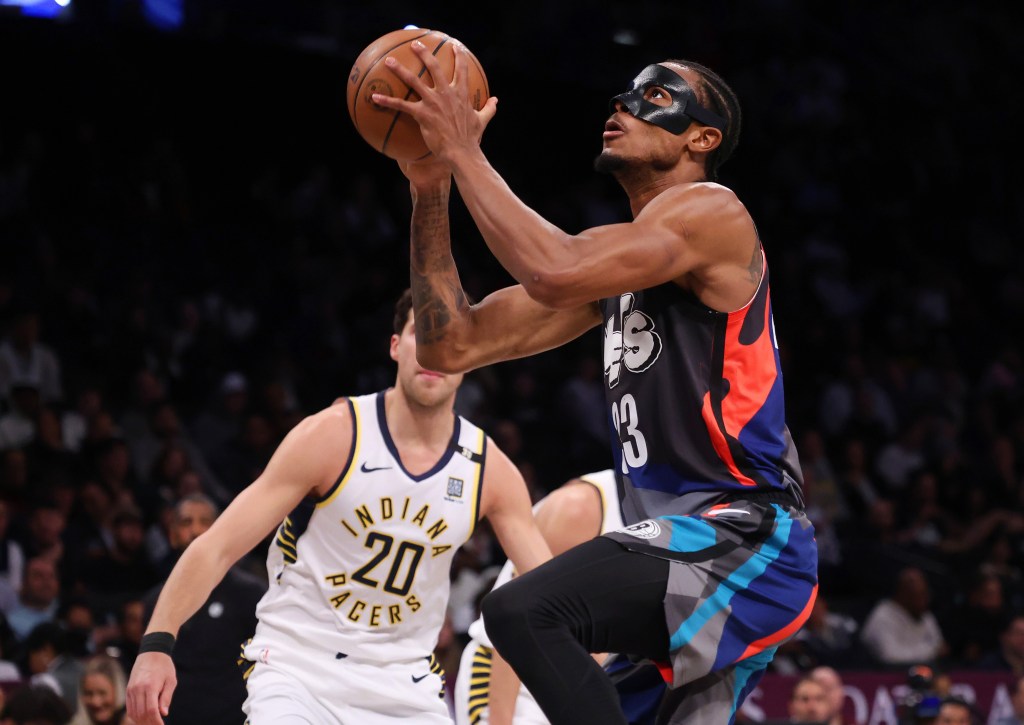 Nic Claxton, who scored 14 points, goes up for a shot during the Nets' victory.