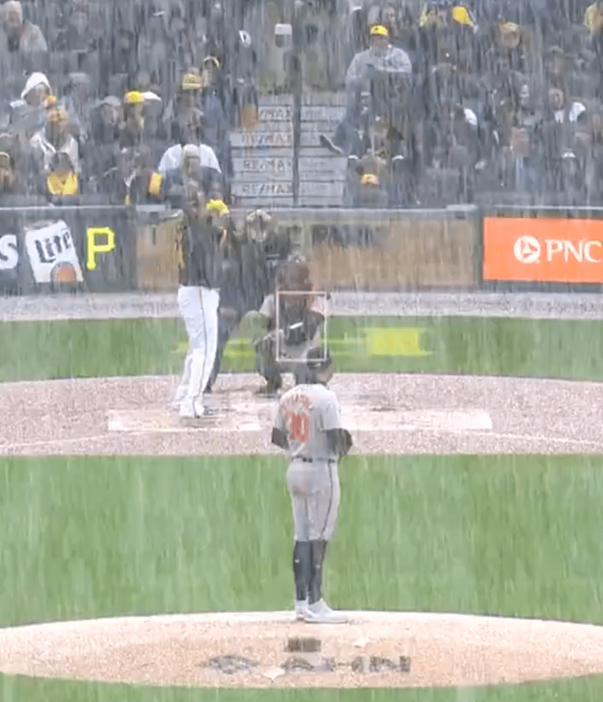 Snow falls during the Pirates home opener against the Orioles.
