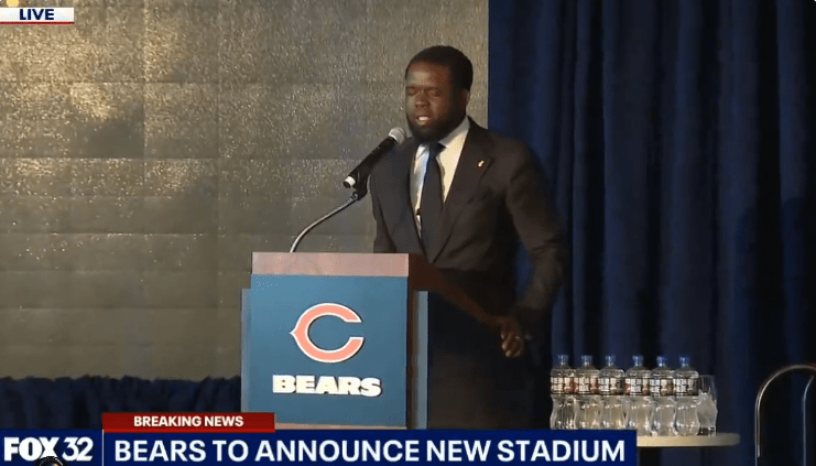 Rev. Dr. Charlie E. Dates led a prayer for a new stadium deal at a Bears press conference on Wednesday.