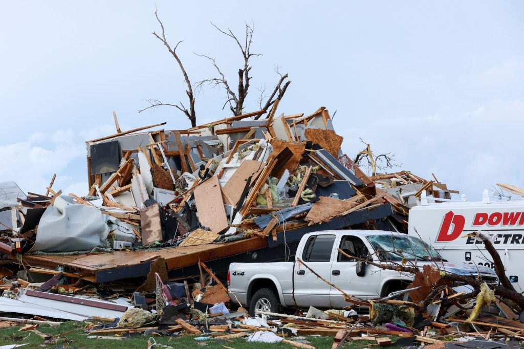 Damage is seen to home after it was leveled by a tornado near Omaha, Neb., on Friday, April 26, 2024. 