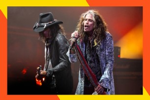 Aerosmith guitarist Joe Perry (L) and lead singer Steven Tyler perform in concert.