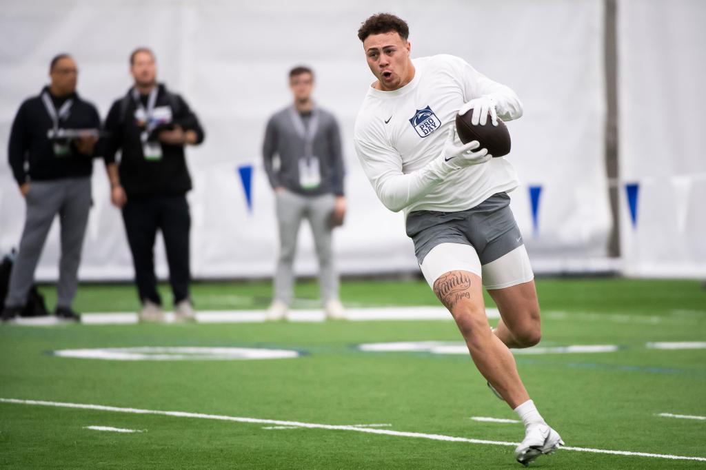 Tight end Theo Johnson catches a pass during Penn State's Pro Day in Holuba Hall on March 15, 2024, in State College.