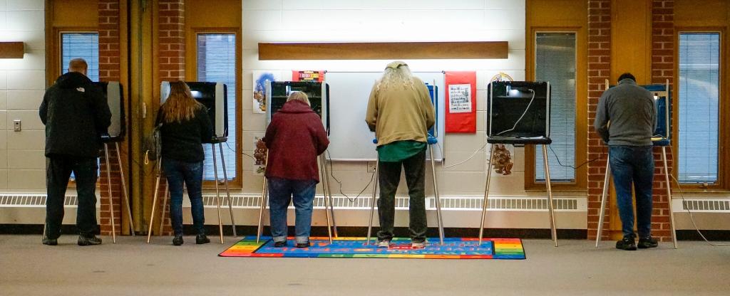 Voters nearly fill all the booths at the First United Lutheran church poll, Tuesday, April 2, 2024, in Sheboygan, Wis.