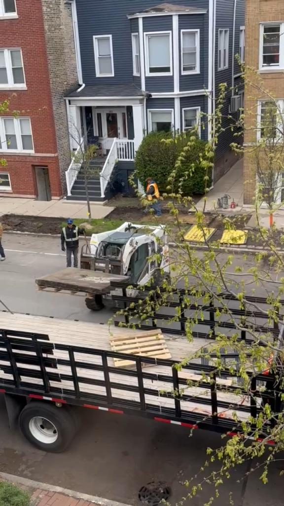 A Chicago sidewalk landmark some residents affectionately called the “rat hole" was removed Wednesday after city officials determined the section bearing the imprint of an animal was damaged and needed to be replaced