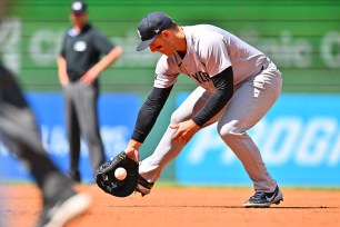 Yankees first baseman Anthony Rizzo commits an error during the second inning of Sunday's loss in Cleveland.