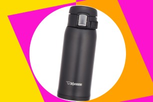 Black Zojirushi water bottle on a yellow and pink background