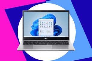 A laptop with a blue flower on the screen