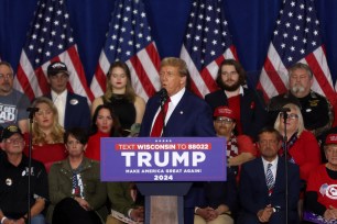 Former US President and 2024 presidential hopeful Donald Trump speaks during a campaign rally at the Hyatt Regency in Green Bay, Wisconsin, on April 2, 2024.