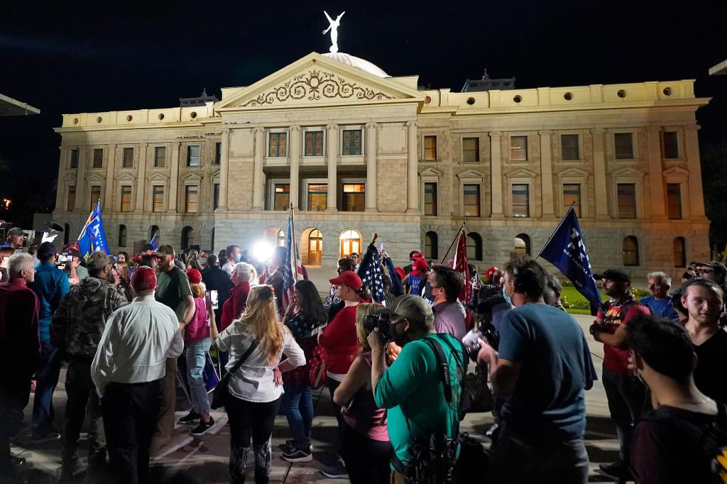 President Trump supporters gather for a voters rights rally, Wednesday, Nov. 4, 2020, at the Capitol in Phoenix.