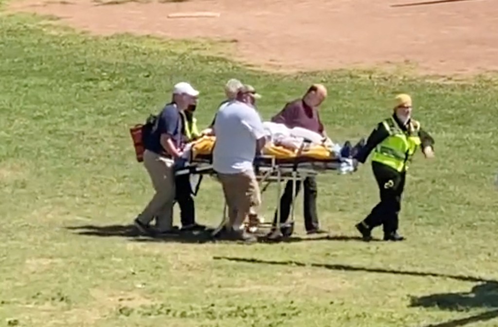 Author Salman Rushdie being transported in a stretcher by first responders after being stabbed at the Chautauqua Institution 