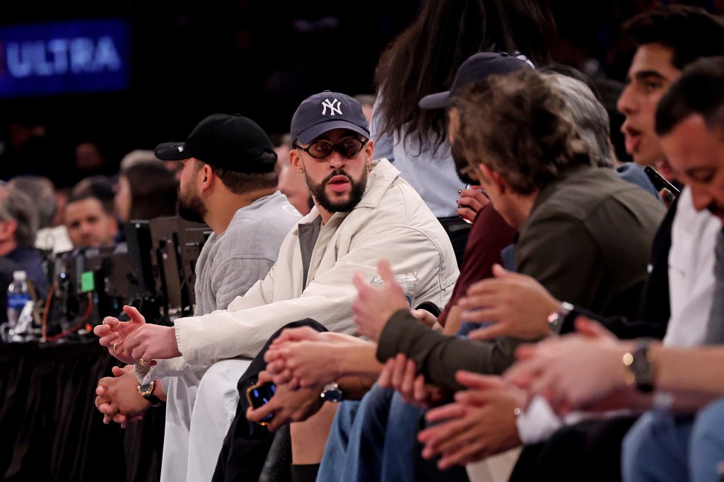 Bad Bunny sits on celebrity row during a Knicks game last month.