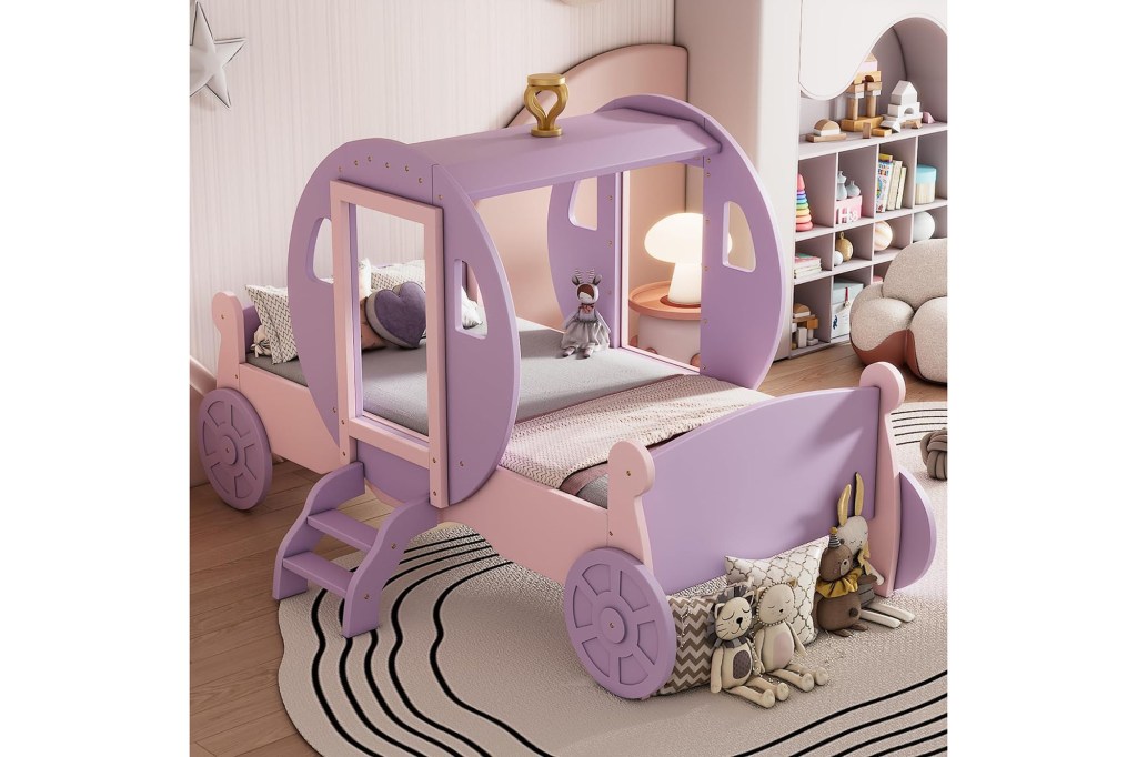 A pink and purple bed in a room