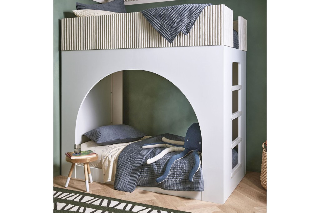 A white bunk bed with a blue and white blanket