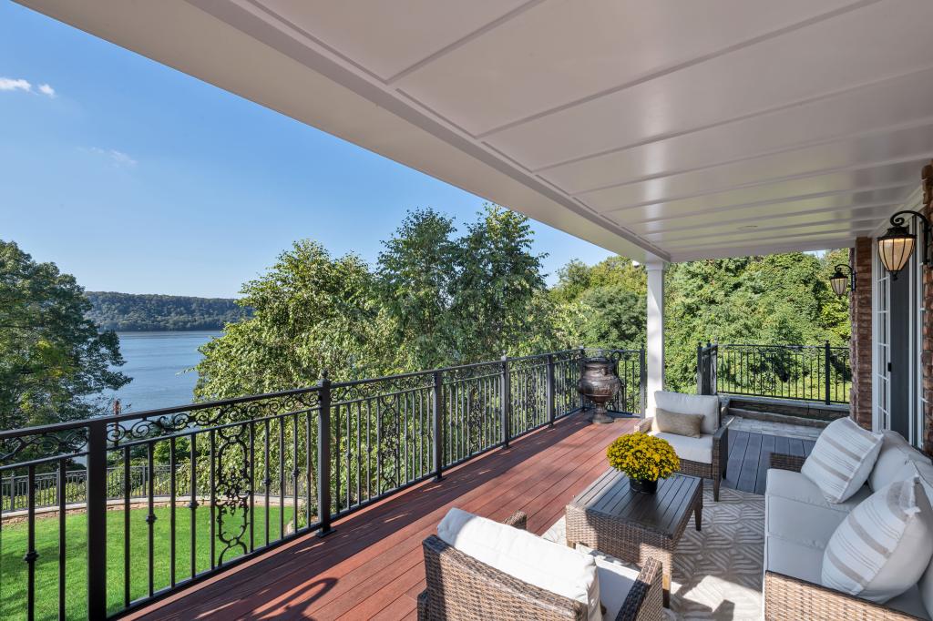 This terrace looks out to lush surroundings.