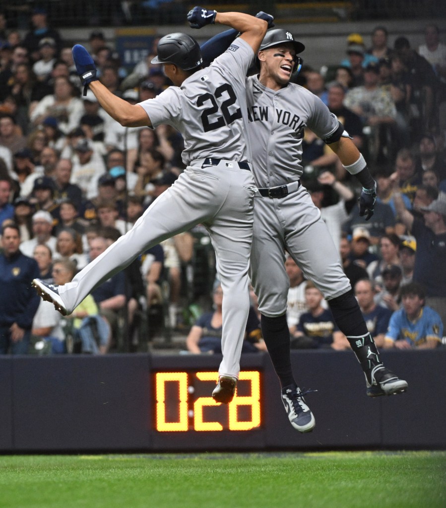 Aaron Judge celebrates with Yankees teammate Juan Soto (22) after hitting a home run against the Brewers on Sunday.