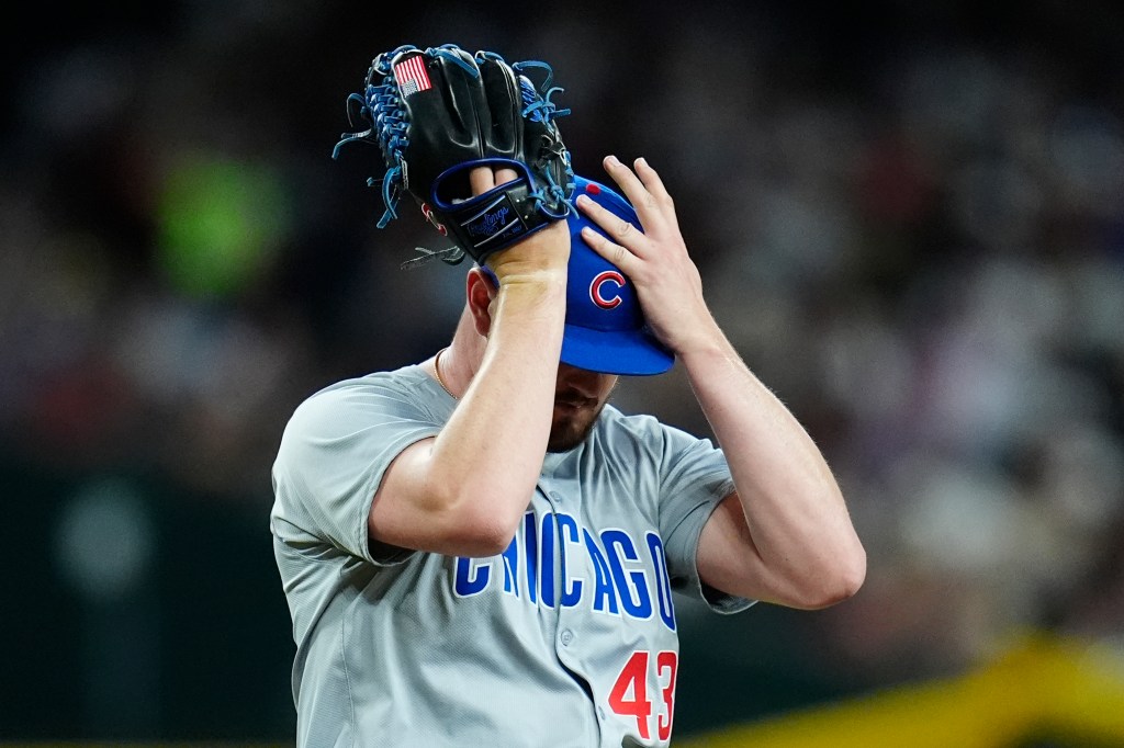 Chicago Cubs relief pitcher Luke Little pausing on the mound during a baseball game against the Arizona Diamondbacks