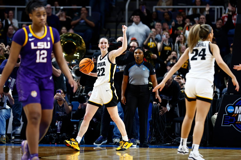 Caitlin Clark hit nine 3-pointers and added 12 assists during Iowa's win in the Elite Eight.