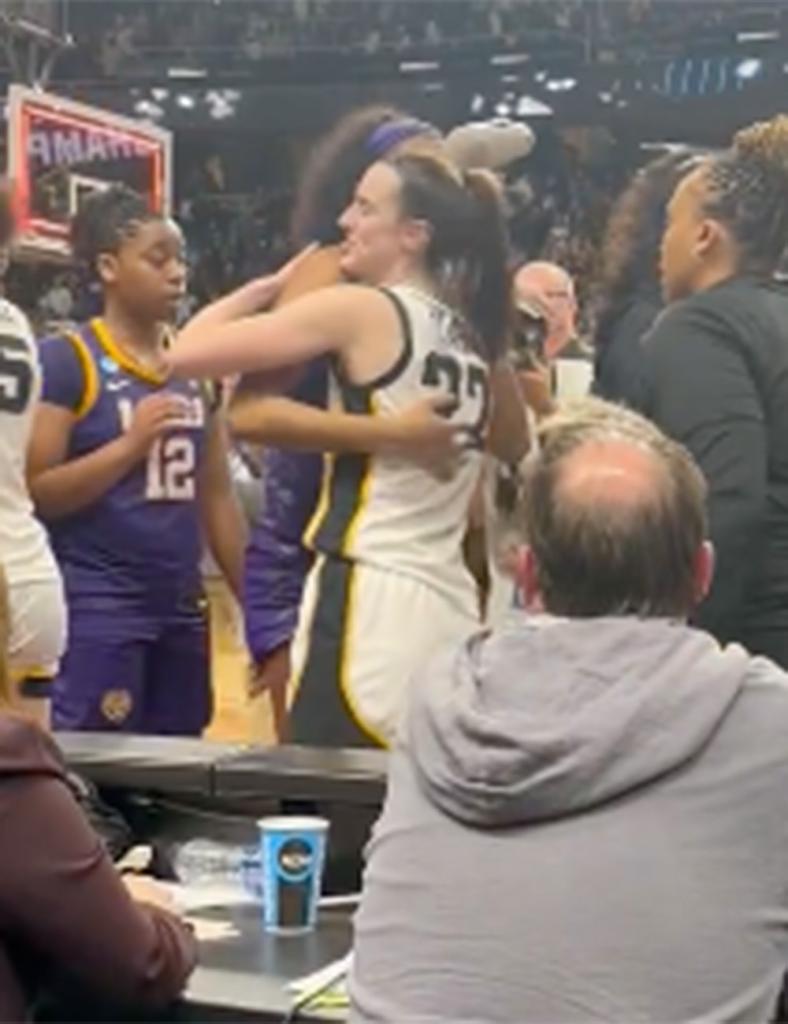 LSU forward Angel Reese and Iowa guard Caitlin Clark share a hug after the Hawkeyes beat the Tigers 94-87 in their Elite Eight matchup in Albany on April 1, 2024.