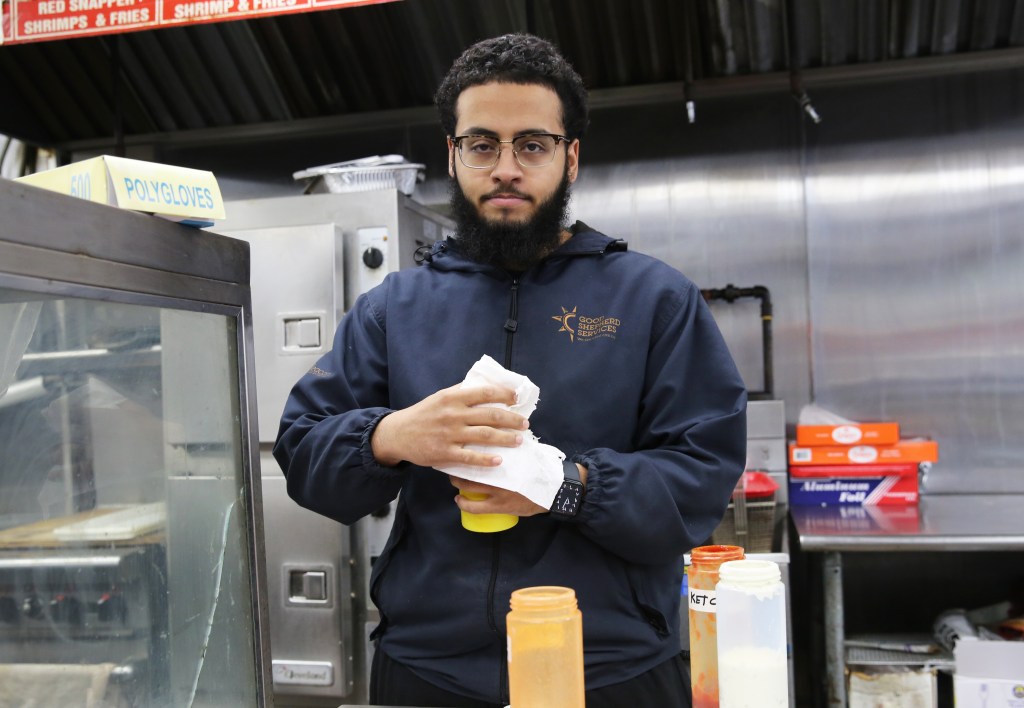 Noah Ali, who works at the Best Fresh Fruit & Fish Market,