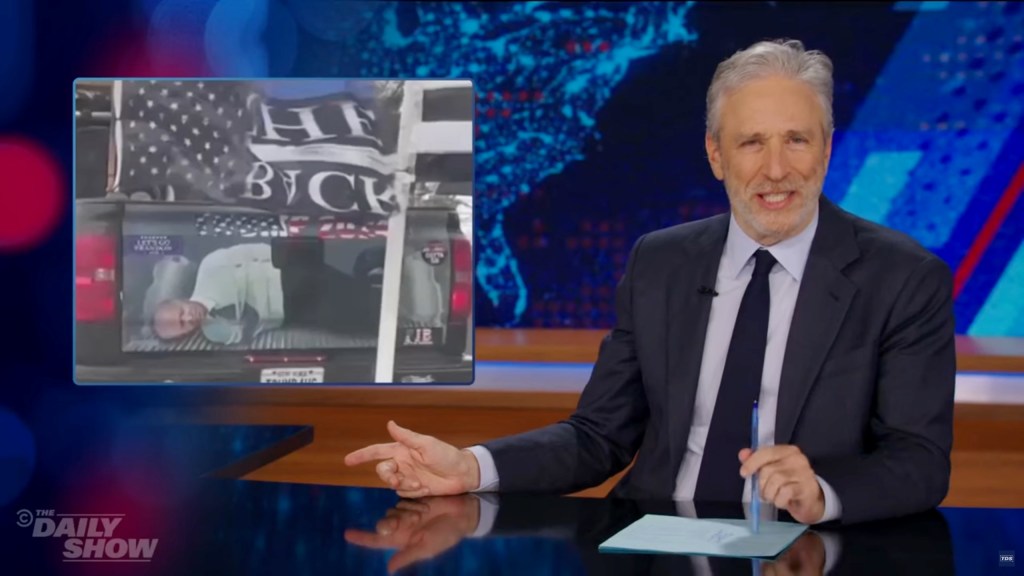 "Daily Show" host Jon Stewart mocked MSNBC for not airing what it deemed a "disturbing" image of a decal of President Biden hog-tied. 