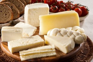 Different types of cheese, bread and tomatoes