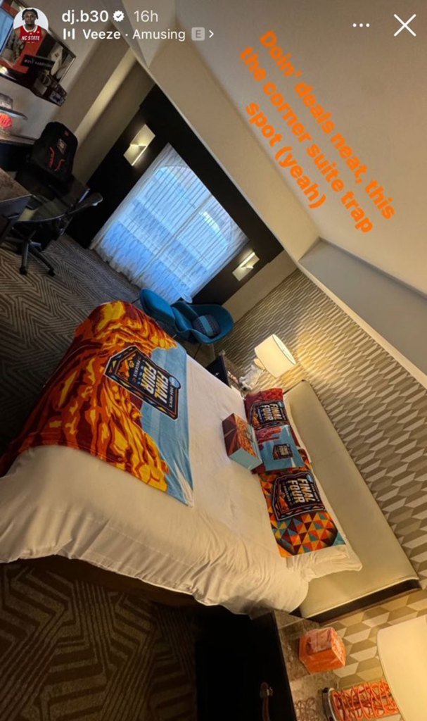 NC State's DJ Burns appears to have a king-sized bed in his hotel room for the Final Four.