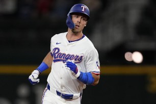 Evan Carter and the Rangers face the Athletics on Wednesday.