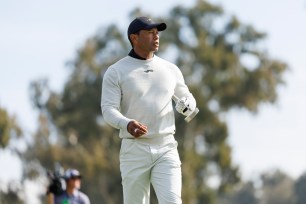 Tiger Woods walks to the green on the third hole during the first round of the Genesis Invitational golf tournament at Riviera Country Club, Thursday, Feb. 15, 2024, in the Pacific Palisades area of Los Angeles. Woods has played only 24 holes in one tournament going into the Masters.