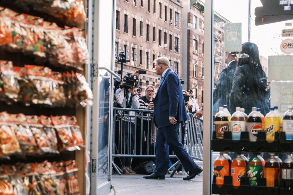 Former US president Donald Trump visits the Sanaa Convenience Store in Hamilton Heights in upper Manhattan.