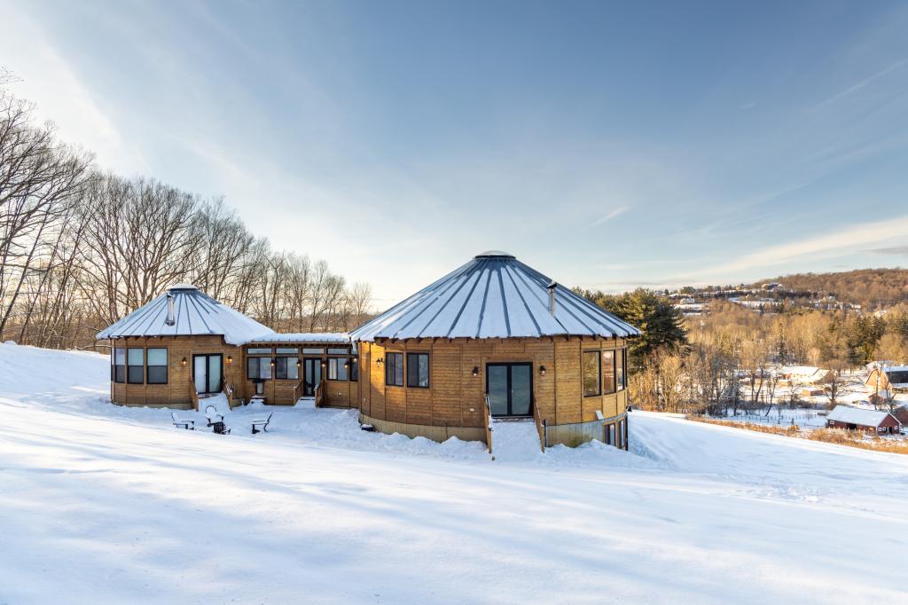 The hilltop yurt sits on 37.5 acres of land connected to the Appalachian Trail.