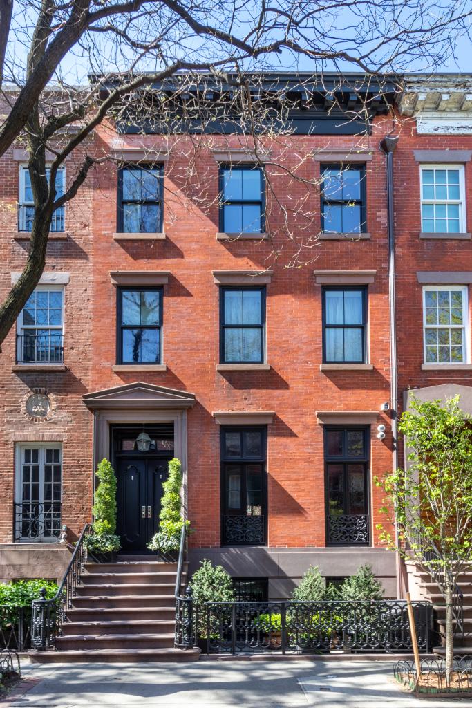 The West Village home's charming red brick exterior.